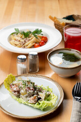 Italian pasta with salad and soup for a siesta lunch in a cafe