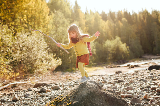 Girl playing outside, Sweden
