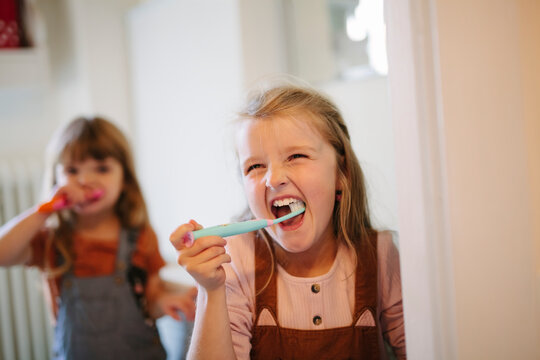 Girl brushing teeth, Sweden