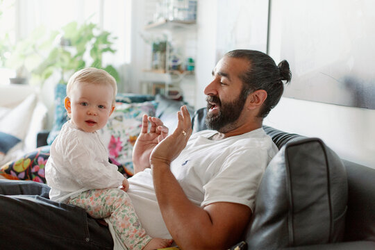Father with baby at home, Sweden