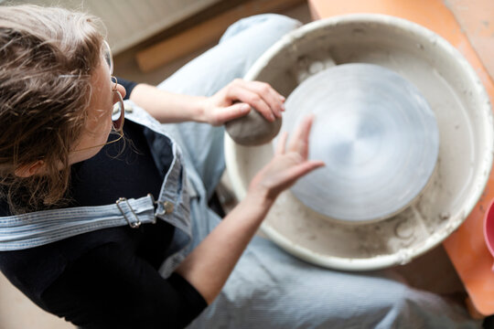 Woman using potters wheel, Sweden