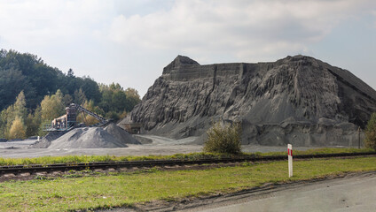Dumping ground, stone mine in Poland - 394470707