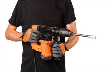 Man hold orange perforator drill at studio