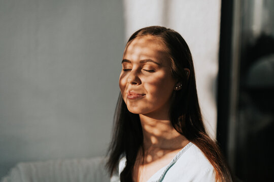 Woman relaxing with her eyes closed, Sweden