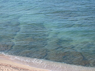 Beautiful view of the azure Mediterranean Sea in autumn in Israel close-up. The photo can be used as a banner for advertising. There is room for text. 