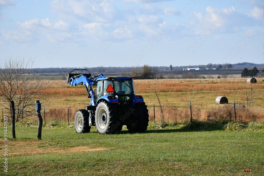 Sticker tractor in a field