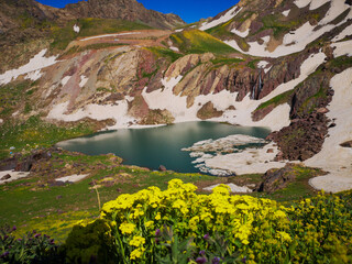 View of a lake in mountains. Hakkari cilo sat lakes, snowy mountains and natural scenery
