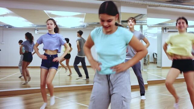 Boys and girls learn to Polka dances in dance studio