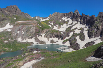 View of a lake in mountains. Hakkari cilo sat lakes, snowy mountains and natural scenery
