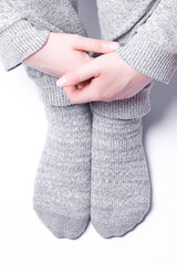 Feet in warm gray socks