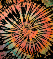 Spiral tie dye texture. Reverse swirl tiedye pattern. Tie-dye background in pastel orange green yellow. - 394482519
