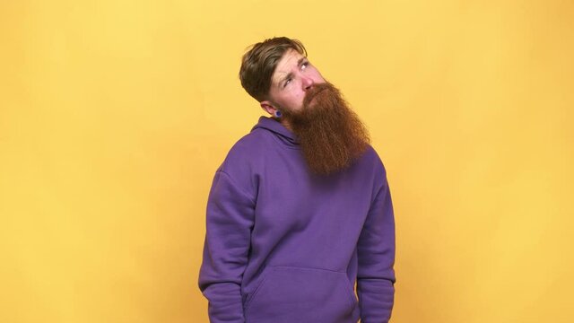 Young adult bearded caucasian man isolated confused, feels doubtful and unsure