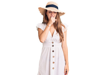 Young beautiful blonde woman wearing summer dress and hat feeling unwell and coughing as symptom...