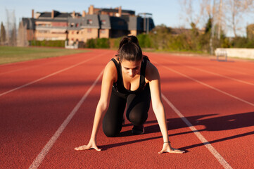 young sportsman on the running track