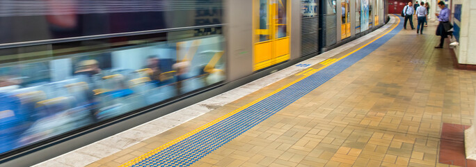 SYDNEY, AUSTRALIA - NOVEMBER 6, 2015: Fast moving subway train in the city center