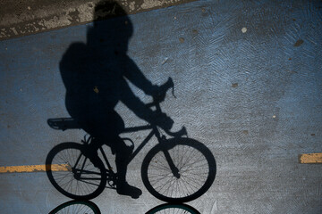 cyclist shadow on the street