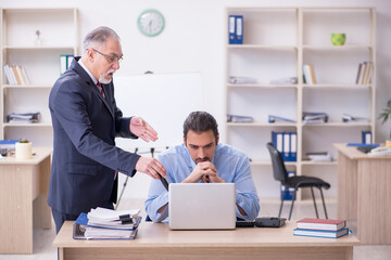 Two employees in the office