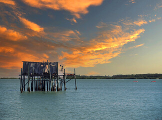 Cedar Key Florida Honeymoon cottage with kyacks at sunset