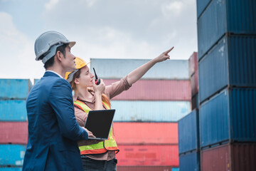 Container Shipping Logistics Engineering of Import/Export Transportation Industry, Transport Engineers Teamwork Controlling Management Containers Together at Port Ship Loading Dock. Business Team