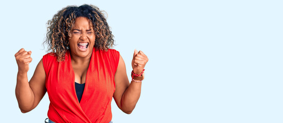 Young african american plus size woman wearing casual style with sleeveless shirt angry and mad...