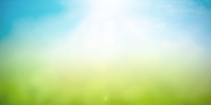 World environment day concept: Abstract blurred beautiful green bokeh light meadow and blue sky on autumn sunrise background