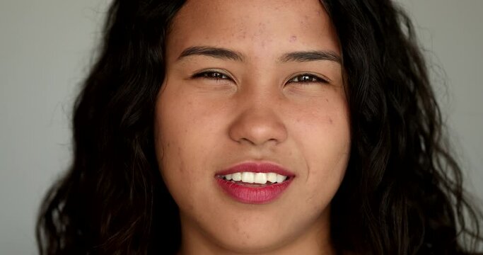 Unbelief reaction, teen girl with doubt cynical emotion close-up face shaking head in negativity