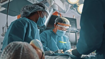 Mixed-race collaborative team of surgeons performing medical surgical serious open heart operation at modern hospital. Coworking. Surgical staff.