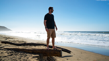 Man Standing on the Beach