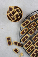 A delicious snack called ChocoStick Cookies. One of a famous snack usually served at Idul Fitri (main Holy day in Moslem religion) have a combination of savory taste biscuit and sweet chocolate stick.