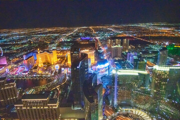 LAS VEGAS, NV - JUNE 29, 2018: Night aerial view of Casinos and Hotels along The Strip. This is the famous city road full of Casinos and Hotels
