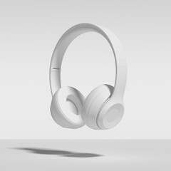 Headphones Isolated On White Background. Abstract Image of White Painted Headphones, Falling, Floating, Suspended, Isolated Against White. 3d Rendering.