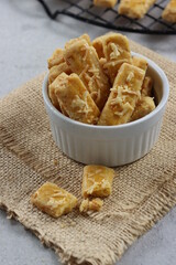 Kastengel or Dutch-Indonesian cookies is the name of cheese cookies which usually served every Eid Mubarak in Indonesia. The taste is salty.