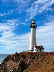 Fototapeta na wymiar Lighthouse On the Ocean Coast