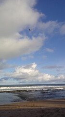 airplane over the beach