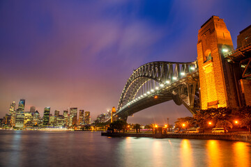 Sydney Harbour Bridge at night with city skyline