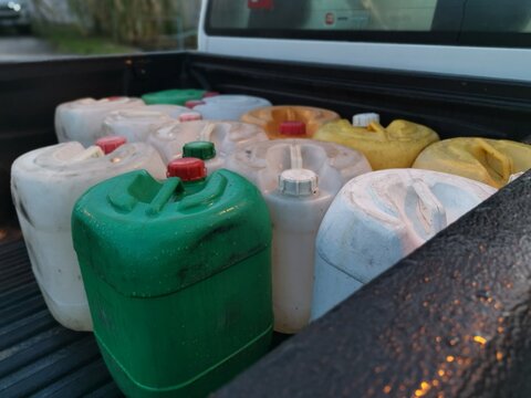 empty plastic containers left at the back of the truck.