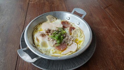 Pan-fried egg with Vietnamese Pork Sausage and mince pork toppings
