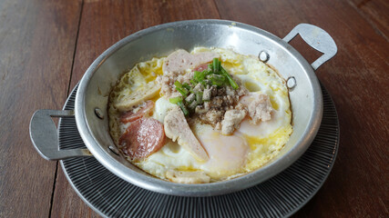 Pan-fried egg with Vietnamese Pork Sausage and mince pork toppings