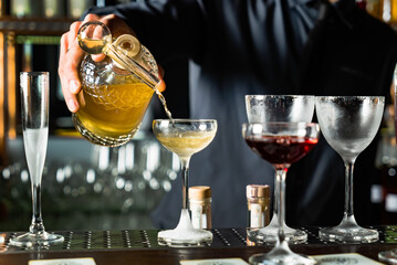 bartender making cocktail in the bar