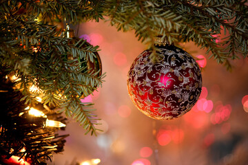 Indoor Christmas tree Decoration with pink bokeh background