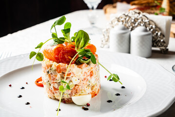 Olivier Potato Salad on white plate