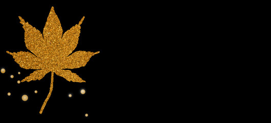 Gold maple leaf on on black background. merry christmas and happy new year.