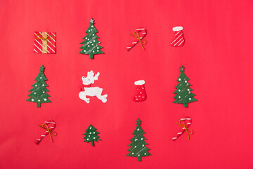 Fototapeta na wymiar Christmas decorations collection for mockup template, Top view flat lay on red table background