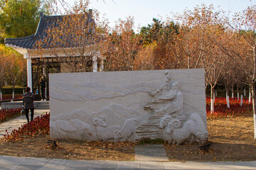 A stone engraving architectures in a park