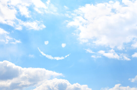 Smilie from cloud in the blue sky