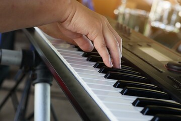 Obraz premium hands of a child playing piano