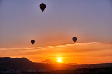 Hot air balloons at sunrise in Cappadocia, Turkey
