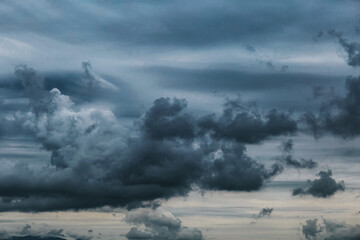 Gloomy storm clouds - overlay for photoshop, background for website and social networks with space...