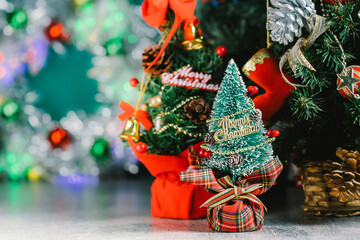 Christmas background with decorations and gift boxes on wooden