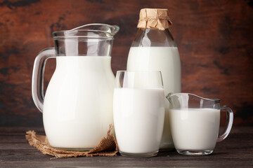 Milk in glass, bottle and jug